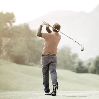 a man playing golf