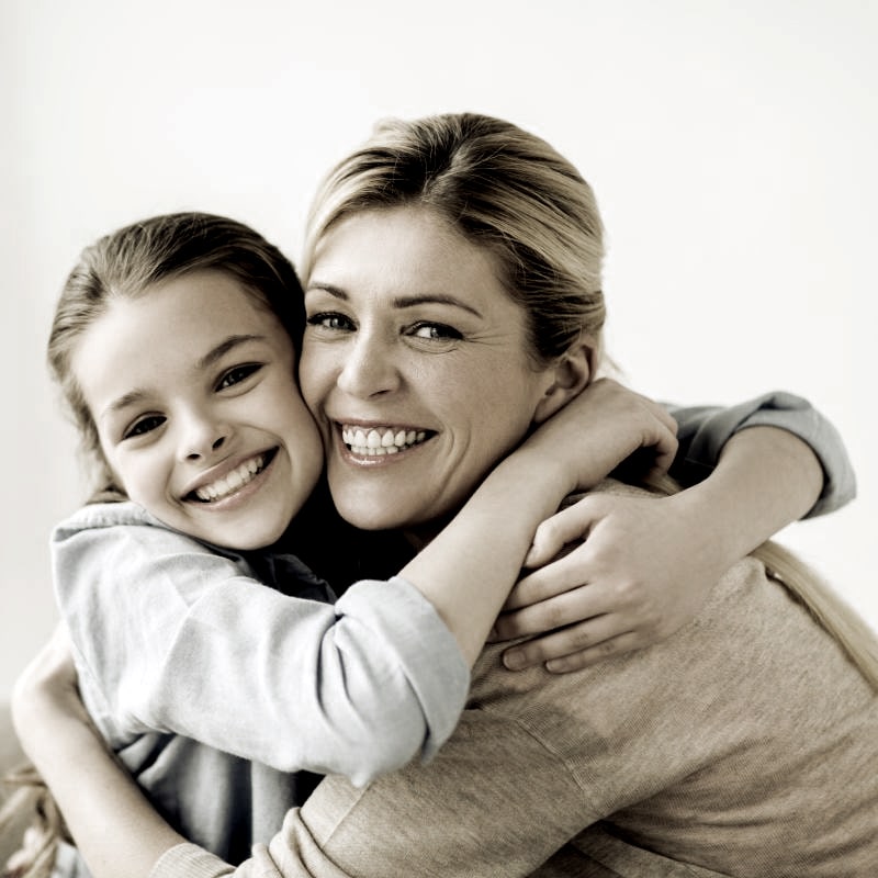 Mom And Daughter Hugging Min